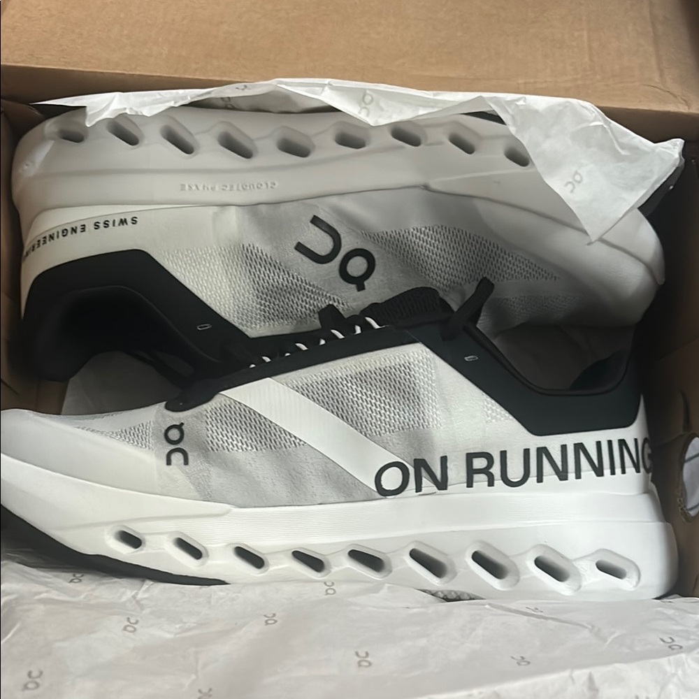 On Running Black and White Performance Athletic Shoes